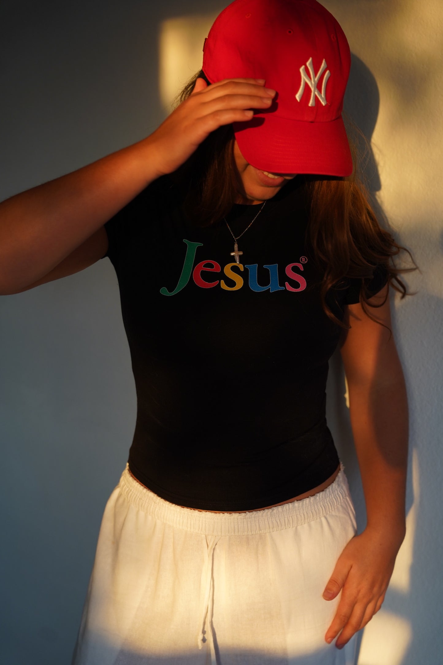 "JESUS.COM" baby tee
