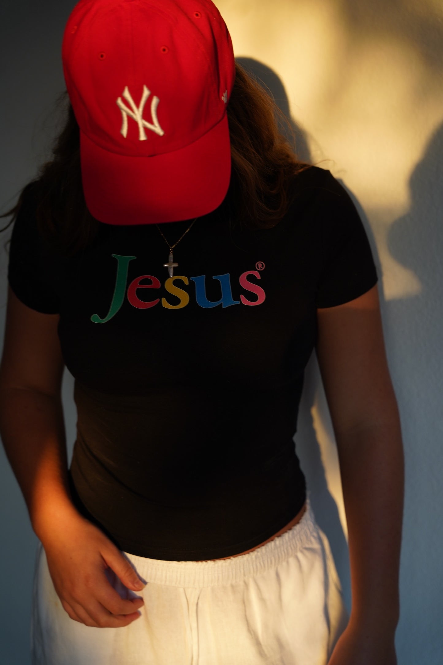 "JESUS.COM" baby tee